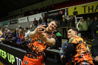 141225 - Dragons RFC v Lyon Olympique Universitaire - European Rugby Challenge Cup - Shane Lewis-Hughes and Ewan Rosser of Dragons with fans at full time