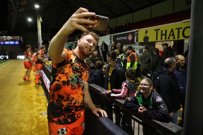 141225 - Dragons RFC v Lyon Olympique Universitaire - European Rugby Challenge Cup - Aneurin Owen of Dragons with fans at full time