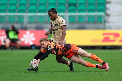 141225 - Dragons RFC v Lyon Olympique Universitaire, EPCR Challenge Cup - David Richards of Dragons and Dorian Diabou of Lyon compete for the ball