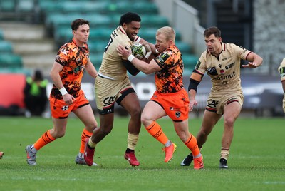 141225 - Dragons RFC v Lyon Olympique Universitaire, EPCR Challenge Cup - Tinus de Beer of Dragons takes on Iosefo Balewairiki of Lyon