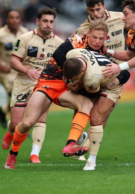 141225 - Dragons RFC v Lyon Olympique Universitaire, EPCR Challenge Cup - Alexandre Tchaptchet of Lyon is held by Alfred Parisien of Lyon