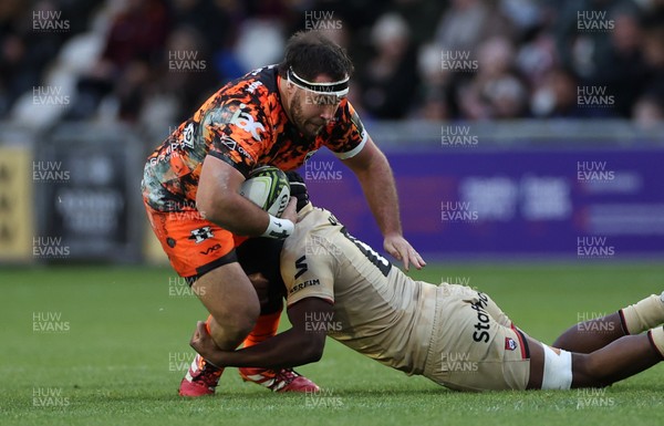 141225 - Dragons RFC v Lyon Olympique Universitaire - European Rugby Challenge Cup - Robert Hunt of Dragons is tackled by Marvin Okuya of Lyon 