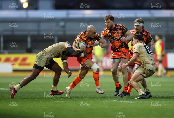 141225 - Dragons RFC v Lyon Olympique Universitaire - European Rugby Challenge Cup - Jared Rosser of Dragons is tackled by Iosefo Balewairiki of Lyon 