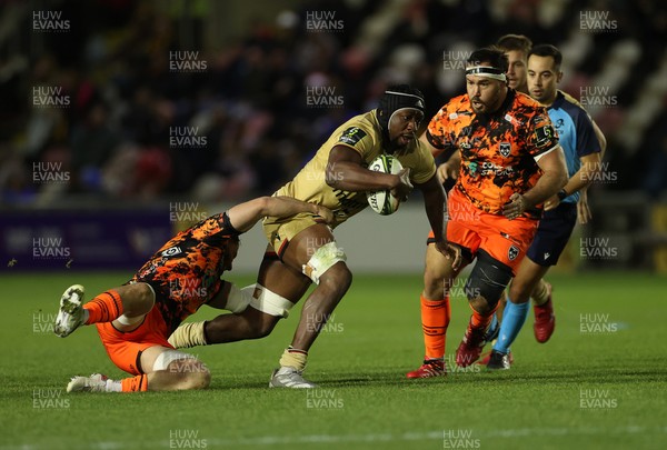 141225 - Dragons RFC v Lyon Olympique Universitaire - European Rugby Challenge Cup - Marvin Okuya of Lyon is tackled by Thomas Young of Dragons 