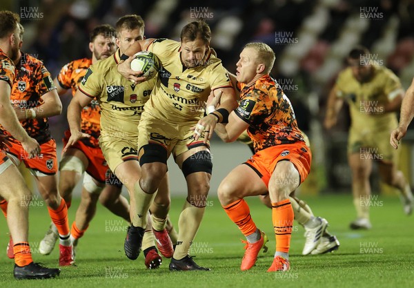 141225 - Dragons RFC v Lyon Olympique Universitaire - European Rugby Challenge Cup - Arno Botha of Lyon is tackled by Tinus de Beer of Dragons 