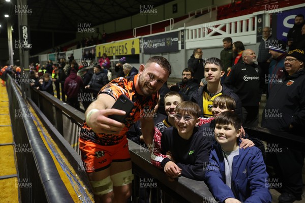 141225 - Dragons RFC v Lyon Olympique Universitaire - European Rugby Challenge Cup - Harri Keddie of Dragons with fans at full time