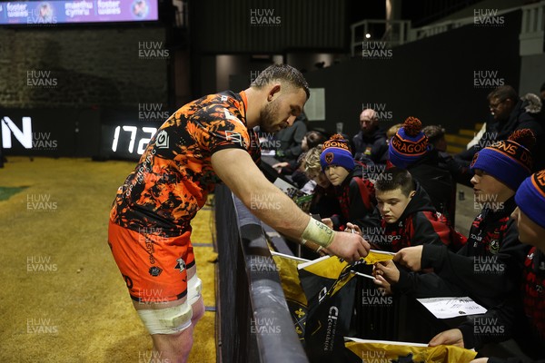 141225 - Dragons RFC v Lyon Olympique Universitaire - European Rugby Challenge Cup - Harri Keddie of Dragons with fans at full time