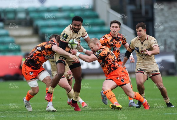 141225 - Dragons RFC v Lyon Olympique Universitaire, EPCR Challenge Cup - Thomas Young of Dragons and Tinus de Beer of Dragons combine to tackled Iosefo Balewairiki of Lyon