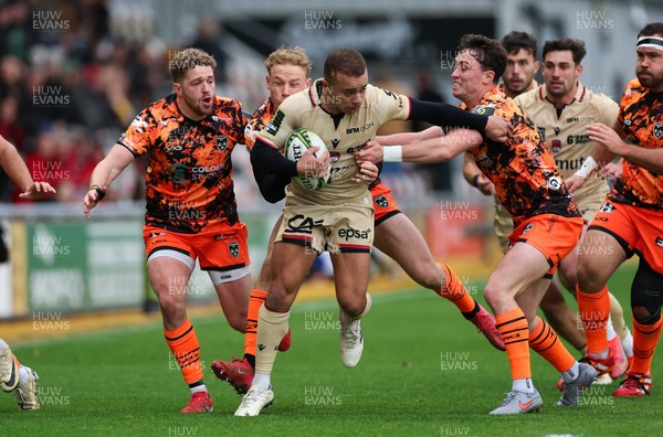 141225 - Dragons RFC v Lyon Olympique Universitaire, EPCR Challenge Cup - Alexandre Tchaptchet of Lyon is held by Alfred Parisien of Lyon