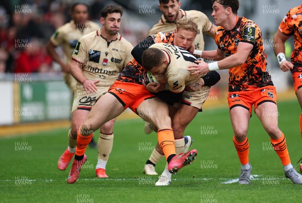 141225 - Dragons RFC v Lyon Olympique Universitaire, EPCR Challenge Cup - Alexandre Tchaptchet of Lyon is held by Alfred Parisien of Lyon