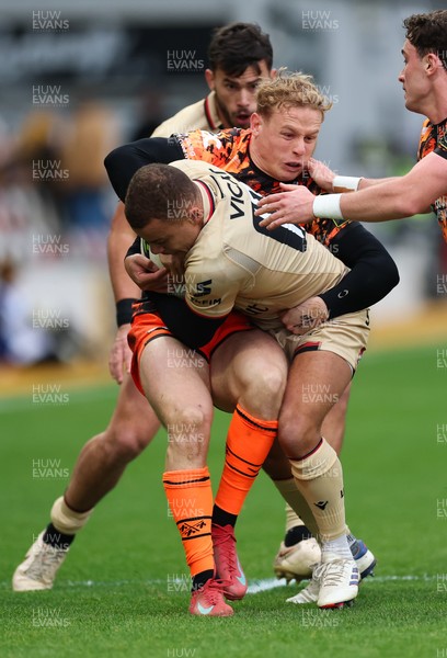 141225 - Dragons RFC v Lyon Olympique Universitaire, EPCR Challenge Cup - Alexandre Tchaptchet of Lyon is held by Alfred Parisien of Lyon