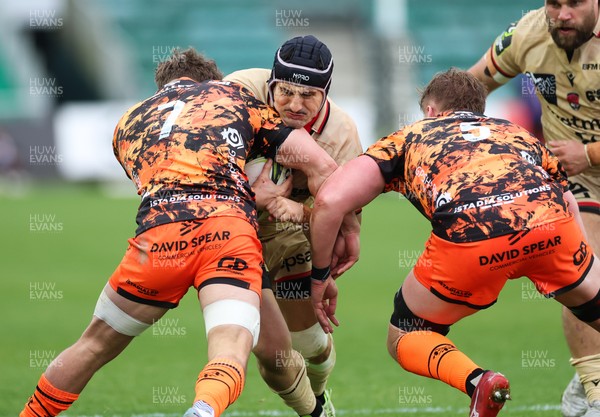 141225 - Dragons RFC v Lyon Olympique Universitaire, EPCR Challenge Cup - Maxime Gouzou of Lyon takes on Thomas Young of Dragons and Matthew Screech of Dragons