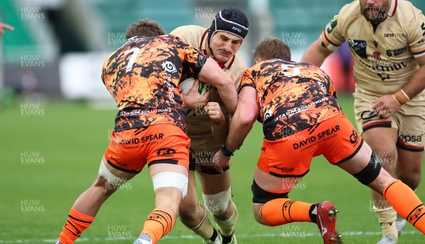 141225 - Dragons RFC v Lyon Olympique Universitaire, EPCR Challenge Cup - Maxime Gouzou of Lyon takes on Thomas Young of Dragons and Matthew Screech of Dragons