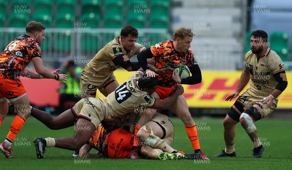 141225 - Dragons RFC v Lyon Olympique Universitaire, EPCR Challenge Cup - David Richards of Dragons is held by Dorian Diabou of Lyon