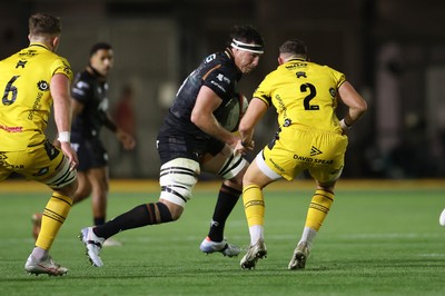 091026 - Dragons RFC v Ospreys - United Rugby Championship - Ryan Smith  of Ospreys is challenged by Elliot Dee of Dragons 