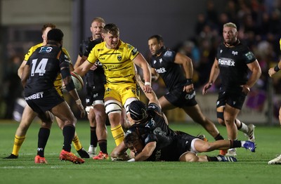 091026 - Dragons RFC v Ospreys - United Rugby Championship - Shane Lewis-Hughes of Dragons is tackled by Morgan Morris of Ospreys