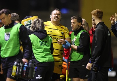 091026 - Dragons RFC v Ospreys - United Rugby Championship - Robert Hunt of Dragons leaves the field injured