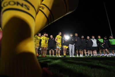 091026 - Dragons RFC v Ospreys - United Rugby Championship - Dragons team huddle at full time