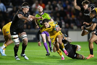 091026 - Dragons RFC v Ospreys - United Rugby Championship - Che Hope of Dragons is challenged by Ross Moriarty of Ospreys