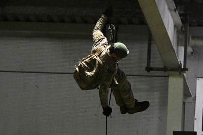 091026 - Dragons RFC v Ospreys - United Rugby Championship - Royal Marines deliver match ball from Rodney Parade roof