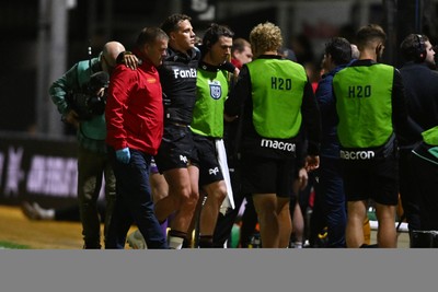 091026 - Dragons RFC v Ospreys - United Rugby Championship - Kieran Hardy of Ospreys is taken off the field injured