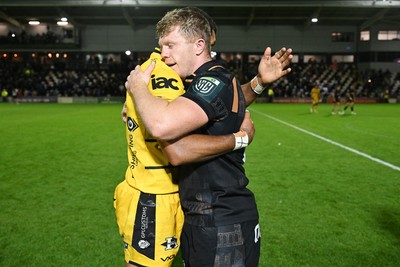 091026 - Dragons RFC v Ospreys - United Rugby Championship - Rio Dyer of Dragons and Keiran Williams of Ospreys
