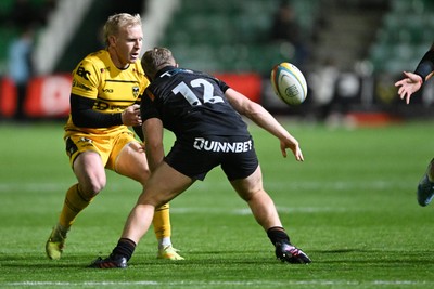 091026 - Dragons RFC v Ospreys - United Rugby Championship - Tinus De Beer of Dragons is challenged by Keiran Williams of Ospreys