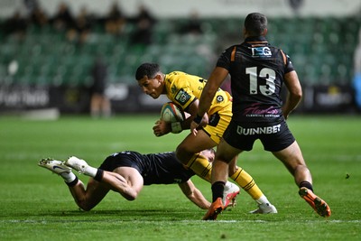 091026 - Dragons RFC v Ospreys - United Rugby Championship - Rio Dyer of Dragons is challenged by Evardi Boshoff of Ospreys