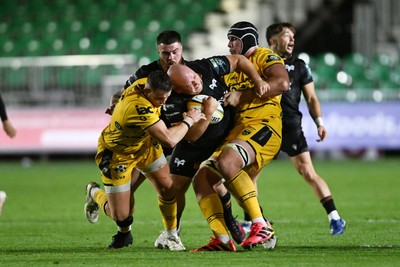 091026 - Dragons RFC v Ospreys - United Rugby Championship - Rhys Henry of Ospreys is challenged by Seb Davies of Dragons