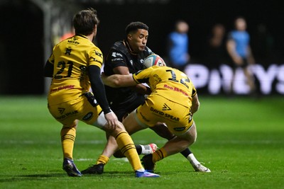 091026 - Dragons RFC v Ospreys - United Rugby Championship - Keelan Giles of Ospreys is challenged by Aneurin Owen of Dragons