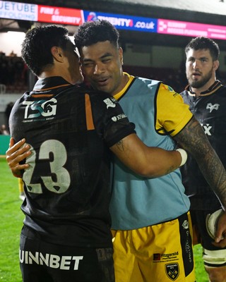 091026 - Dragons RFC v Ospreys - United Rugby Championship - Fetuli Paea of Dragons with Lalakai Foketi of Ospreys at full time