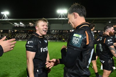 091026 - Dragons RFC v Ospreys - United Rugby Championship - Keiran Williams of Ospreys and Tom Rogers of Ospreys celebrates at full time