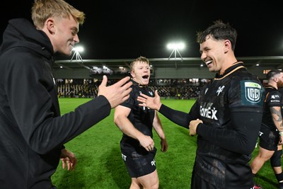 091026 - Dragons RFC v Ospreys - United Rugby Championship - Keiran Williams of Ospreys and Tom Rogers of Ospreys celebrates at full time
