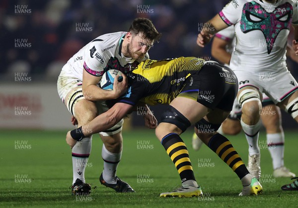 181123 - Dragons RFC v Ospreys - United Rugby Championship - James Ratti of Ospreys is tackled by Matthew Screech of Dragons 