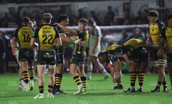 181123 - Dragons RFC v Ospreys, BKT United Rugby Championship - Aki Seiuli of Dragons and Will Reed of Dragons celebrate at the end of the match