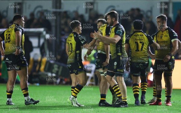181123 - Dragons RFC v Ospreys, BKT United Rugby Championship - Dragons players congratulate each other at the end of the match