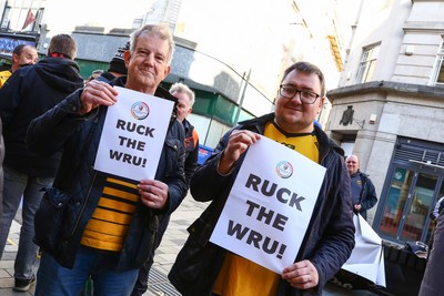 251025 - Dragons RFC v Ospreys - United Rugby Championship - Supporters of Dragons and Ospreys join together on a protest march through Newport centre before the game