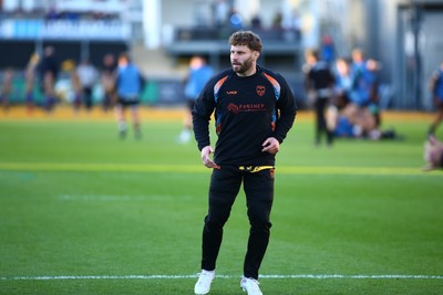 251025 - Dragons RFC v Ospreys - United Rugby Championship - Thomas Young of Dragons warms up before his debut