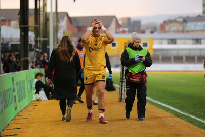 251025 - Dragons RFC v Ospreys - United Rugby Championship - Joe Westwood of Dragons leaves the field injured after 6 minutes