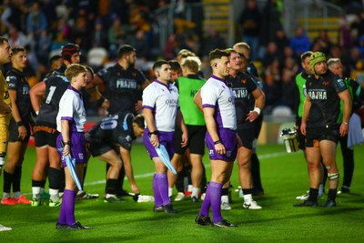 251025 - Dragons RFC v Ospreys - United Rugby Championship - Referee Ben Breakspear and his assistants Amber Stamp Dunstan (L) and Adam Jones confer with the TMO