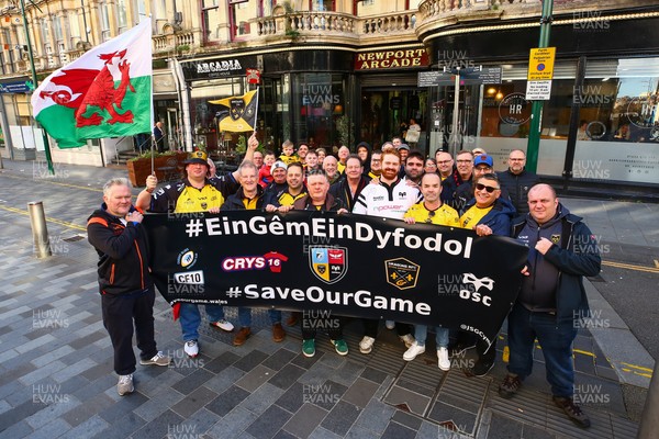 251025 - Dragons RFC v Ospreys - United Rugby Championship - Supporters of Dragons and Ospreys join together on a protest march through Newport centre before the game