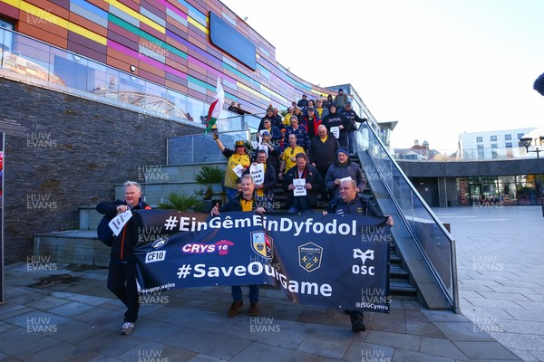 251025 - Dragons RFC v Ospreys - United Rugby Championship - Supporters of Dragons and Ospreys join together on a protest march through Newport centre before the game