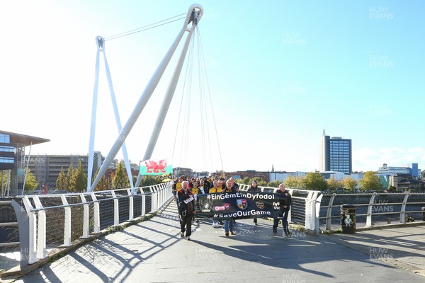 251025 - Dragons RFC v Ospreys - United Rugby Championship - Supporters of Dragons and Ospreys join together on a protest march through Newport centre before the game