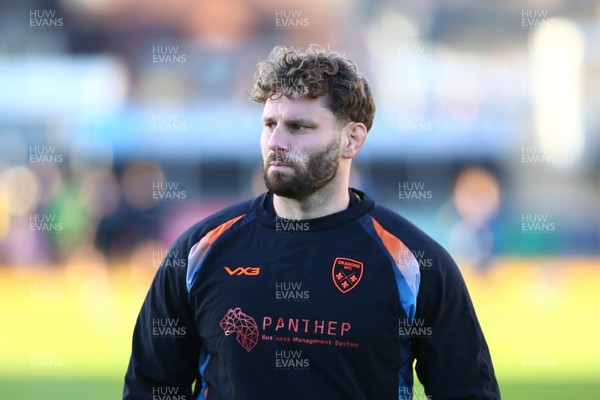 251025 - Dragons RFC v Ospreys - United Rugby Championship - Thomas Young of Dragons warms up before his debut