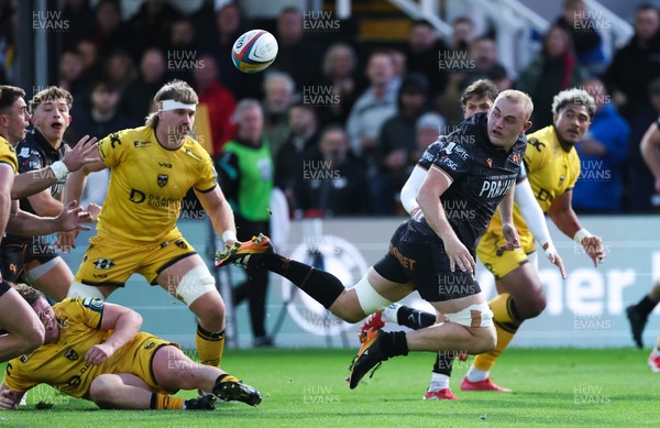 251025 - Newport RFC v Ospreys, United Rugby Championship - Huw Sutton of Ospreys offloads as he is tackled