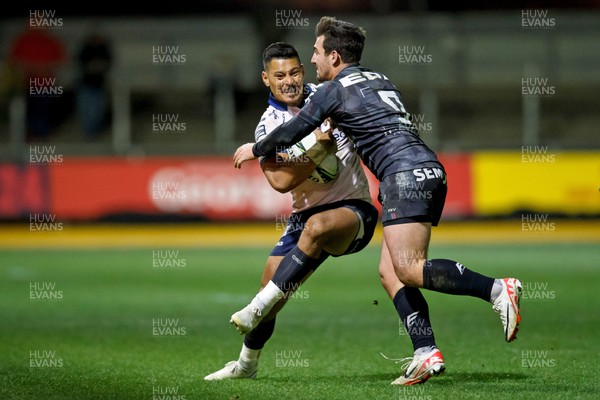 091223 - Dragons RFC v Oyonnax Rugby - EPCR Challenge Cup - Sio Tomkinson of Dragons is tackled by Charlie Cassang of Oyonnax