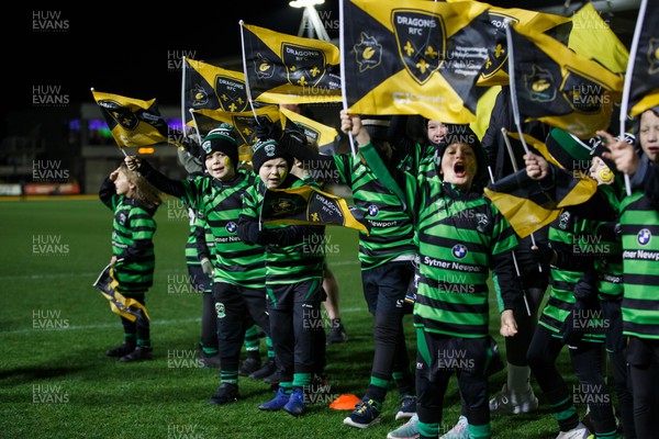 091223 - Dragons RFC v Oyonnax Rugby - EPCR Challenge Cup - Dragons supporters wave flags before the match