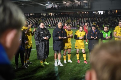 010126 - Dragons RFC v Scarlets - United Rugby Championship - Dragons huddle at full time