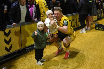 010126 - Dragons RFC v Scarlets - United Rugby Championship - Angus O'Brien of Dragons with family at full time