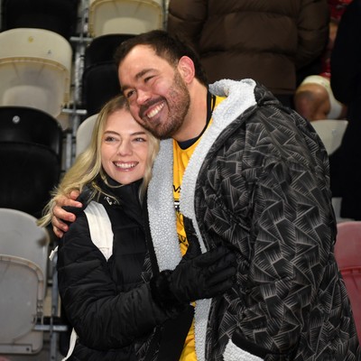 010126 - Dragons RFC v Scarlets - United Rugby Championship - Rob Hunt of Dragons with family at full time